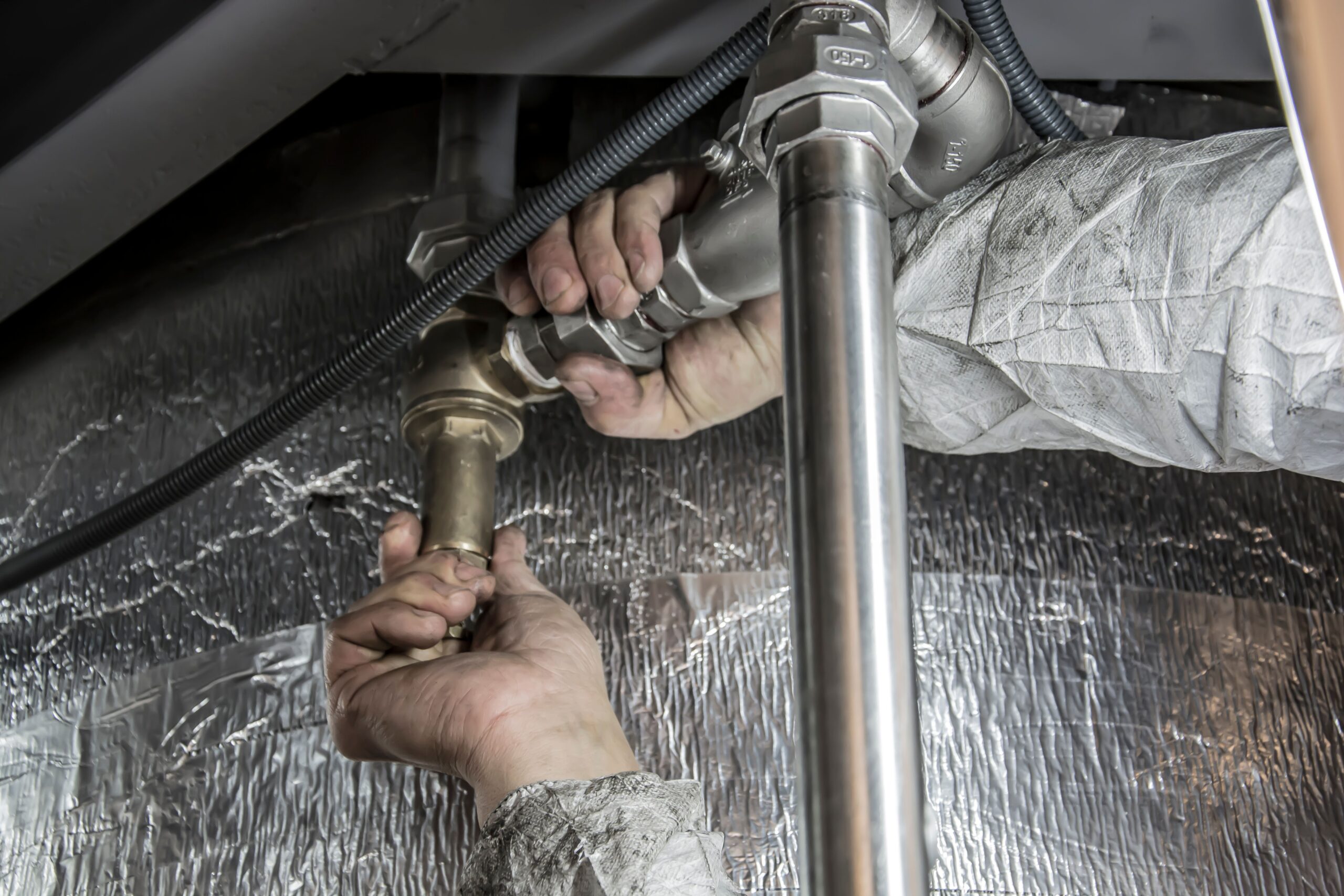 plumber working in Harlow